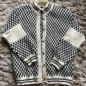 Dressed in lala checkered sweater! Only worn once!